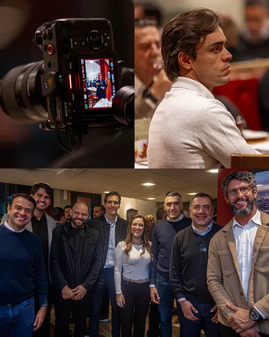 Grupo de convidados do kickoff 2027 no salão do restaurante